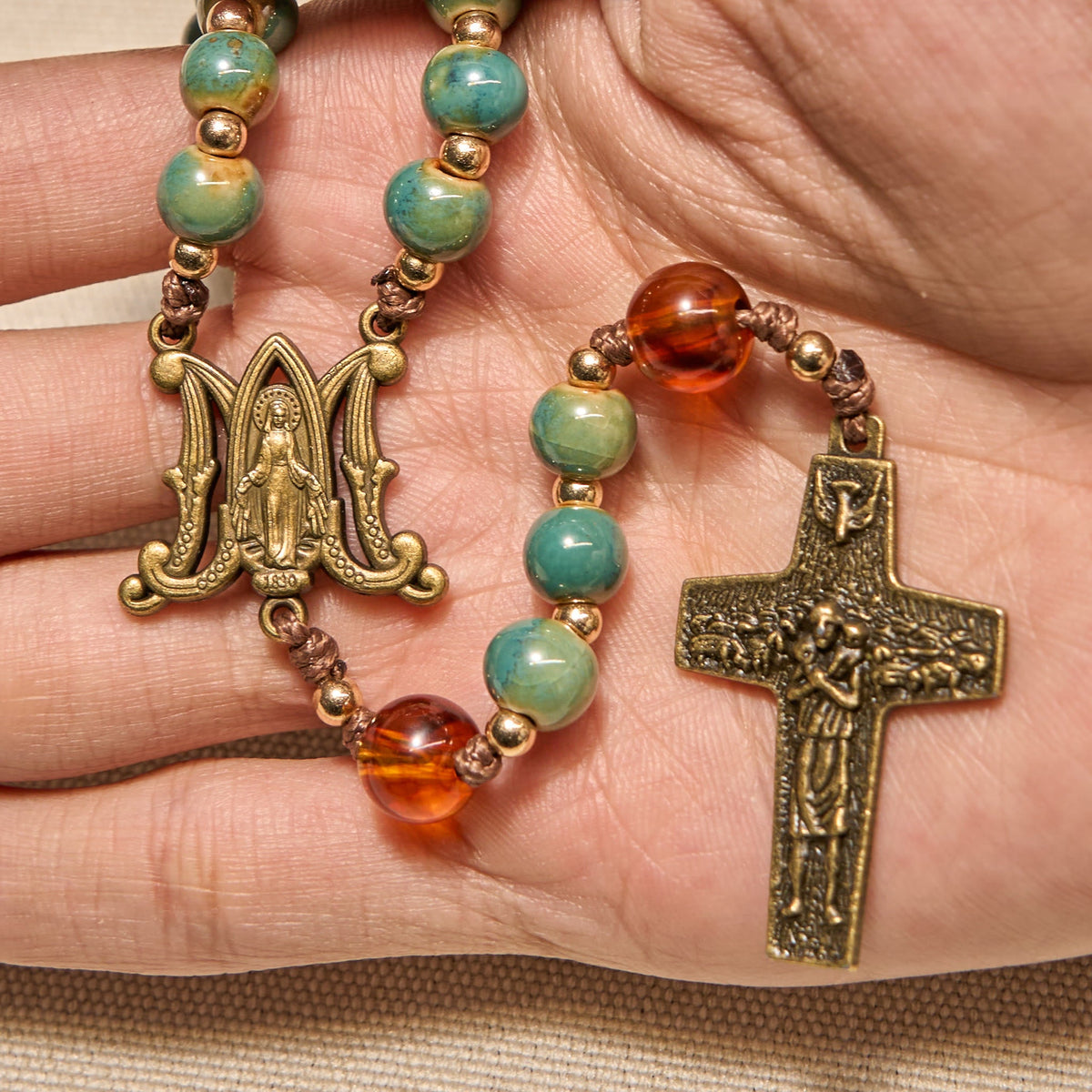 PRAYERFUL FAITH: Handcrafted Green Ceramic Rosary with Amber Beads