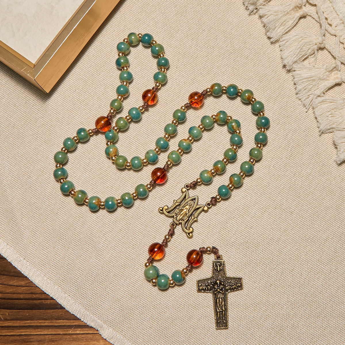 PRAYERFUL FAITH: Handcrafted Green Ceramic Rosary with Amber Beads