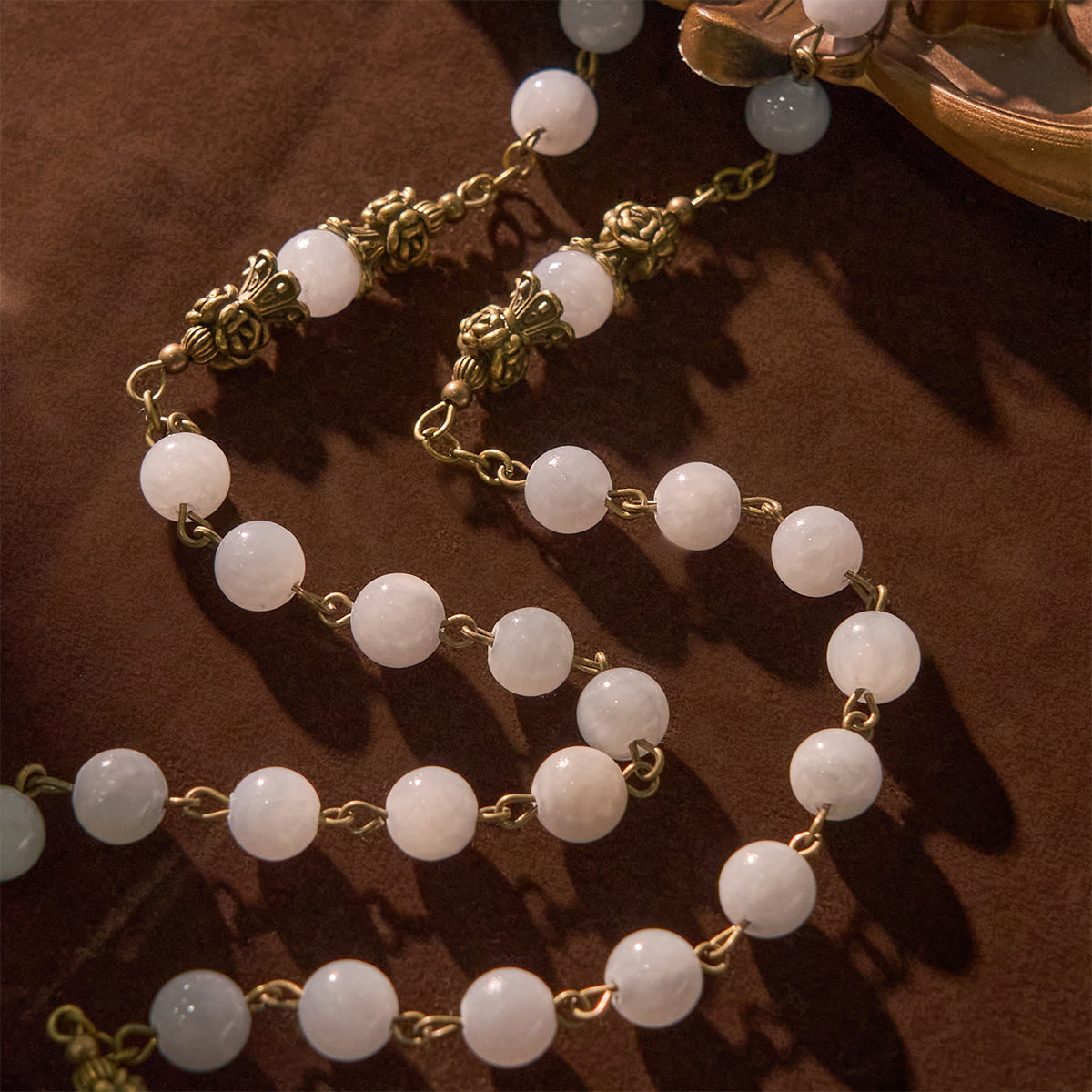 Rosary with Light Blue Jade Beads and Brass - Toned Accents: Your Path to Divine Communion