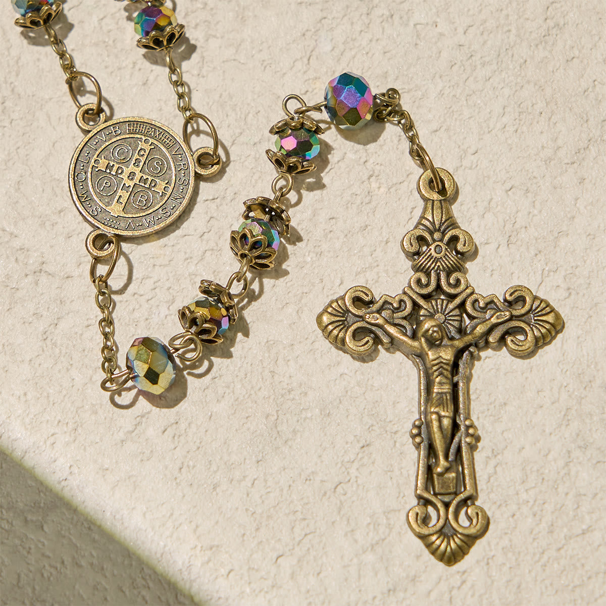 Faithful Hematite Rosary Featuring Bronze Crucifix and Saint Benedict Charm