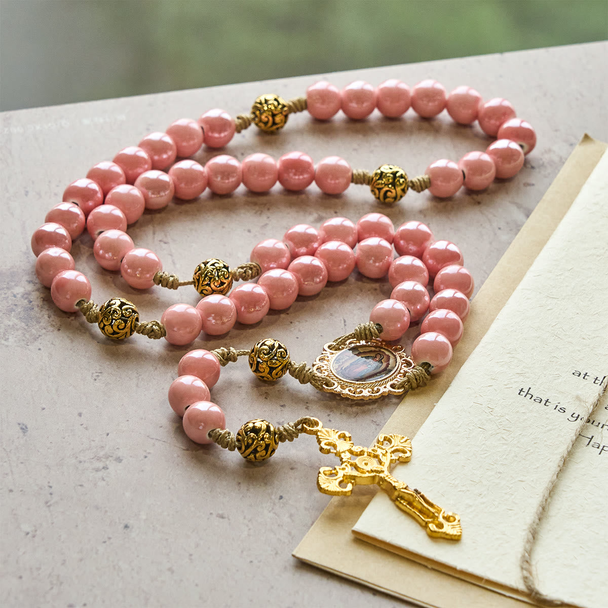 Mary's Light Pink Ceramic Rosary: Celebrate Christmas with Grace and Hope