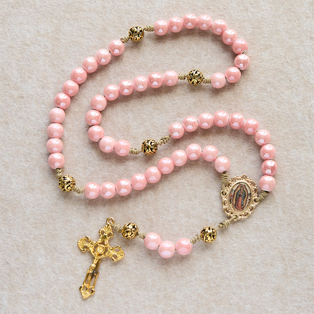 Mary's Light Pink Ceramic Rosary: Celebrate Christmas with Grace and Hope