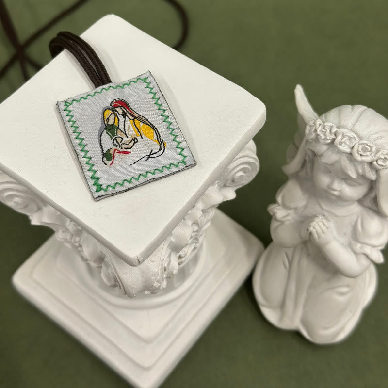 Sacred Jesus & Our Lady Scapular: Tender Reminder of Her Care
