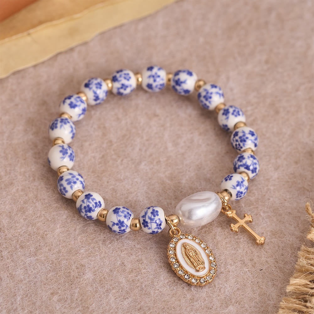 Blue/Pink Floral Ceramic Bead Bracelet with Large White Accent Bead: A Reminder of Divine Grace