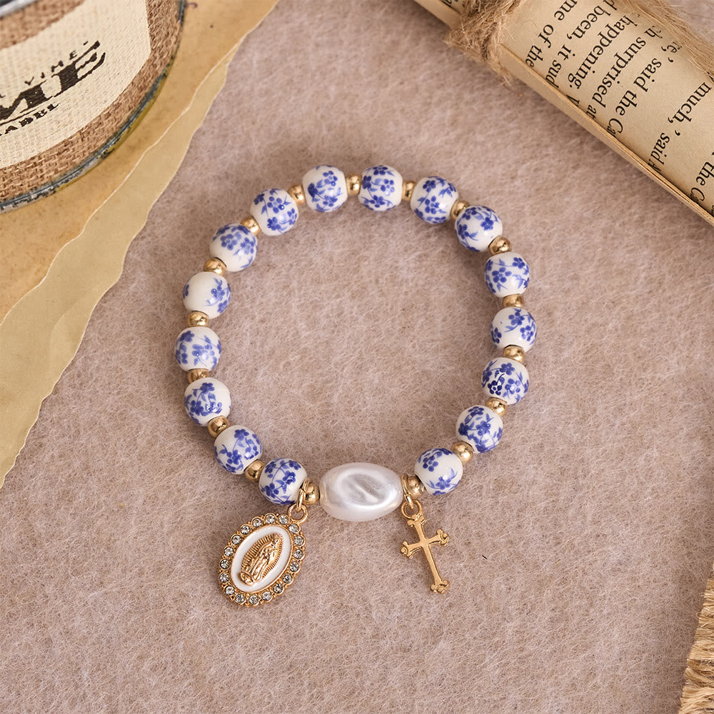 Blue/Pink Floral Ceramic Bead Bracelet with Large White Accent Bead: A Reminder of Divine Grace
