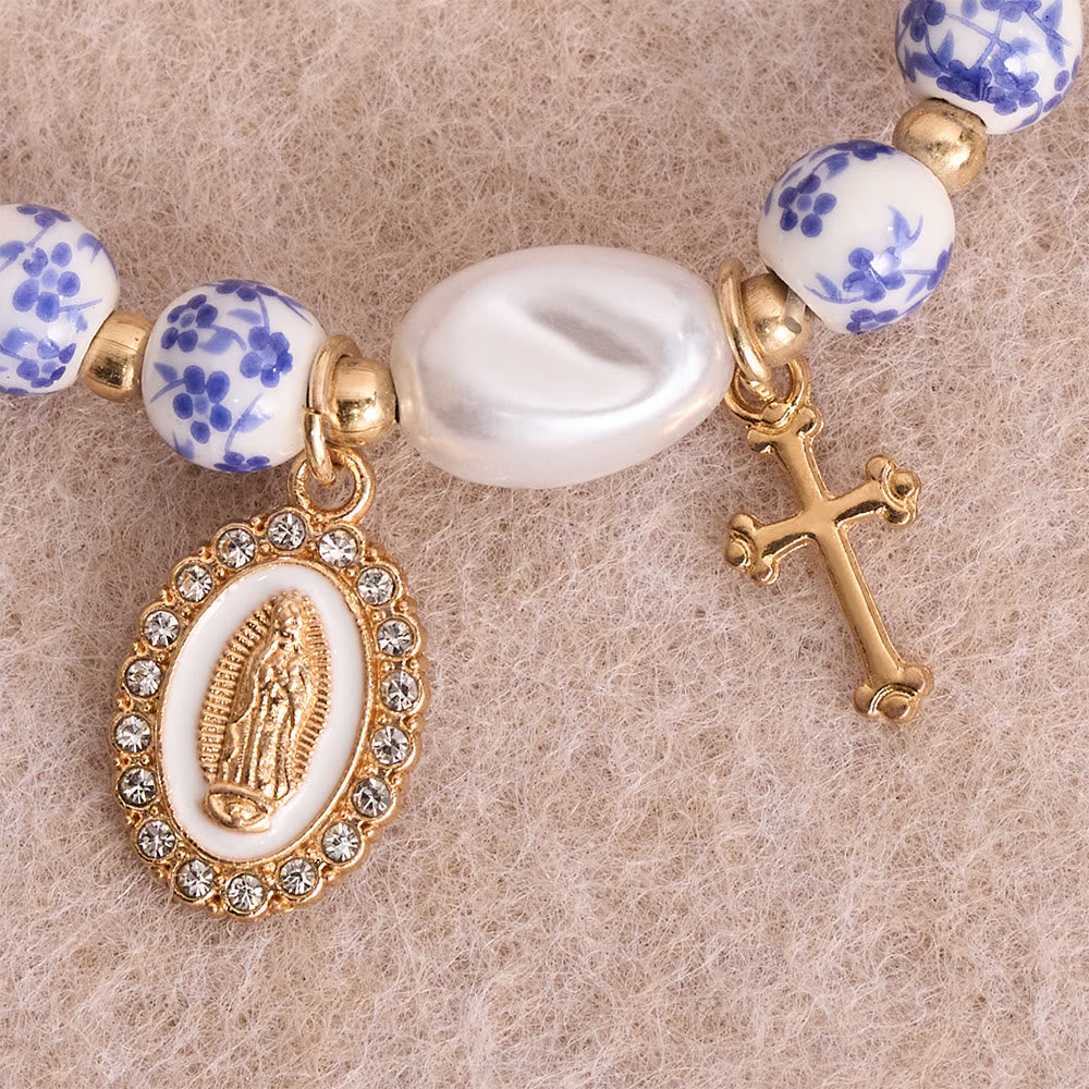 Blue/Pink Floral Ceramic Bead Bracelet with Large White Accent Bead: A Reminder of Divine Grace