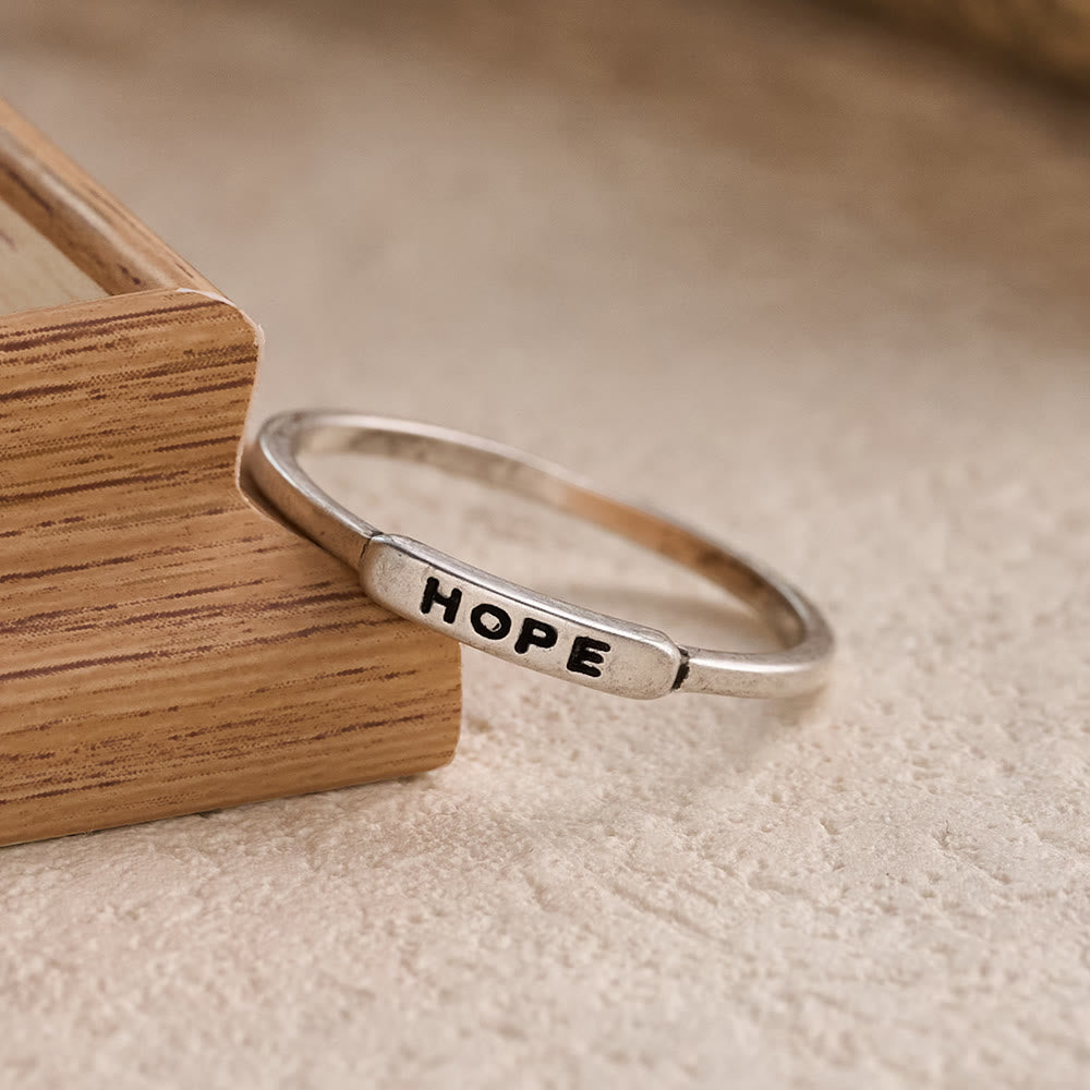 Refined Stackable Ring Set with Engraved BLESSED/FAITH/HOPE Text: An Emblem of Quiet Devotion