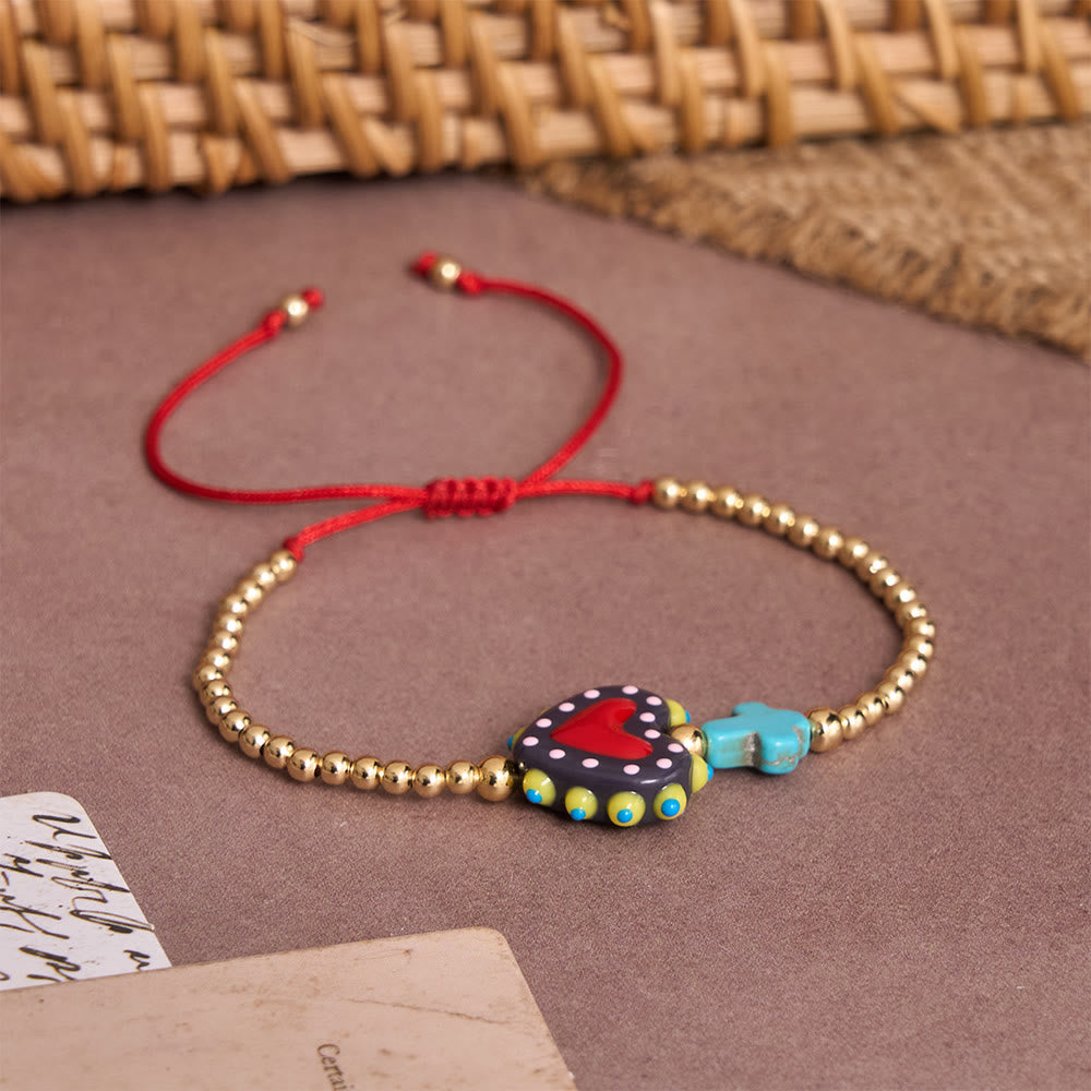Cartoon Style Hand-Decorated Sacred Heart & Tiny Cross Accent Gold Bead Adjustable Cord Bracelet