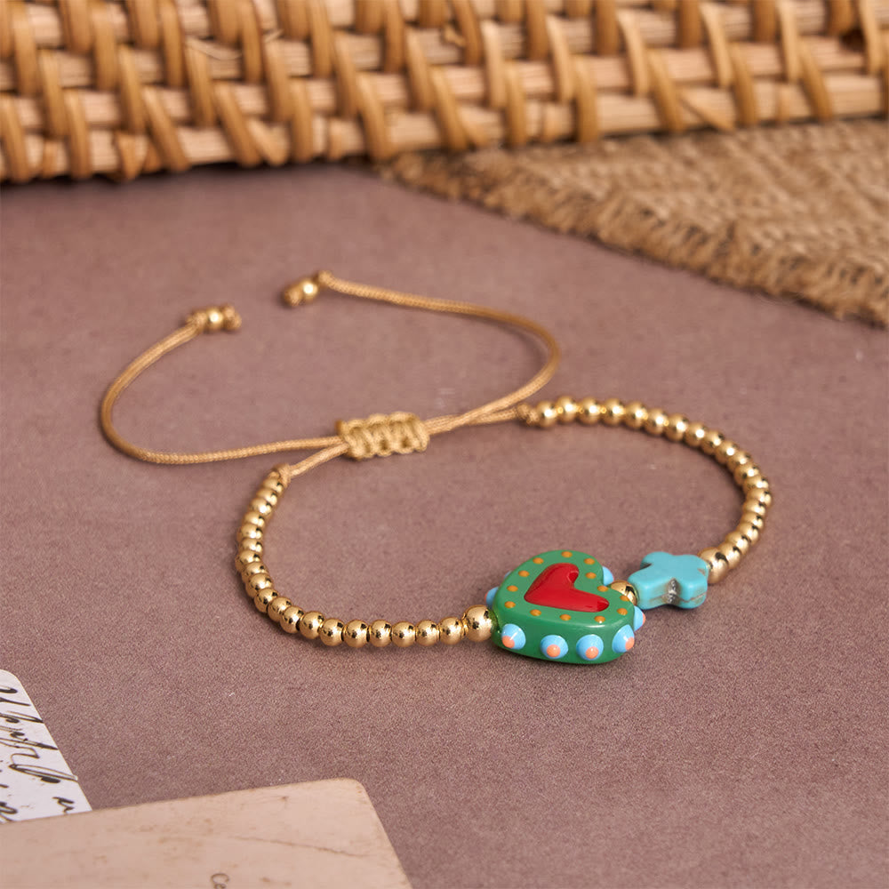 Cartoon Style Hand-Decorated Sacred Heart & Tiny Cross Accent Gold Bead Adjustable Cord Bracelet