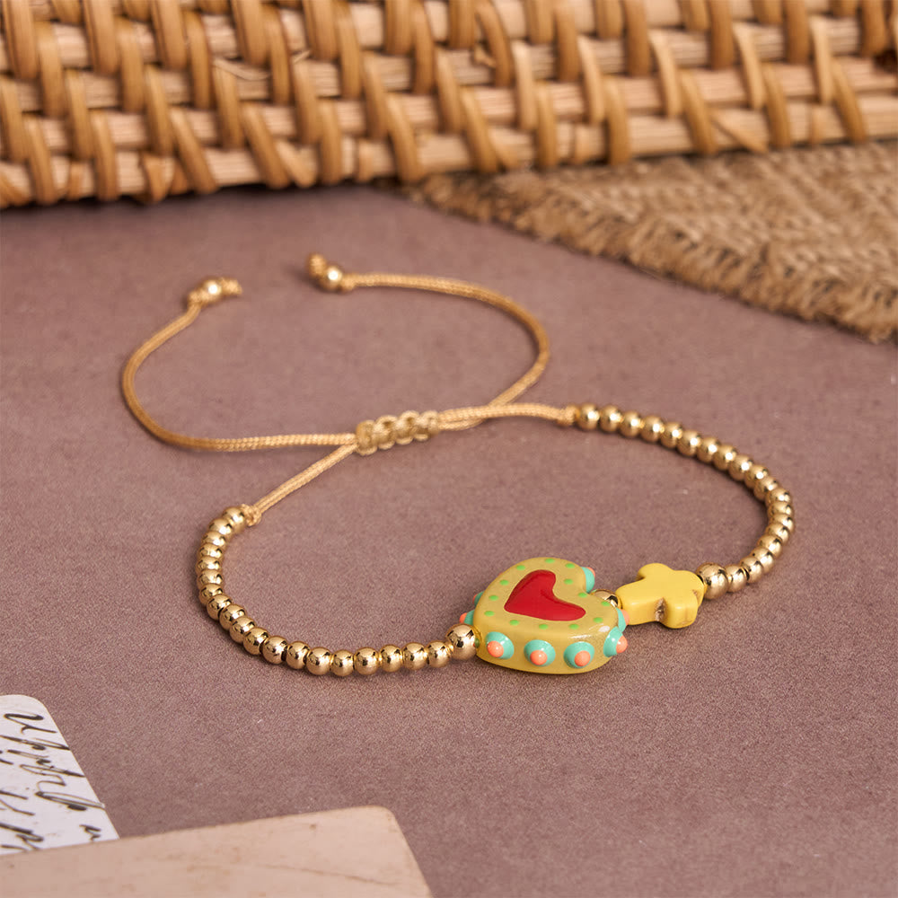 Cartoon Style Hand-Decorated Sacred Heart & Tiny Cross Accent Gold Bead Adjustable Cord Bracelet