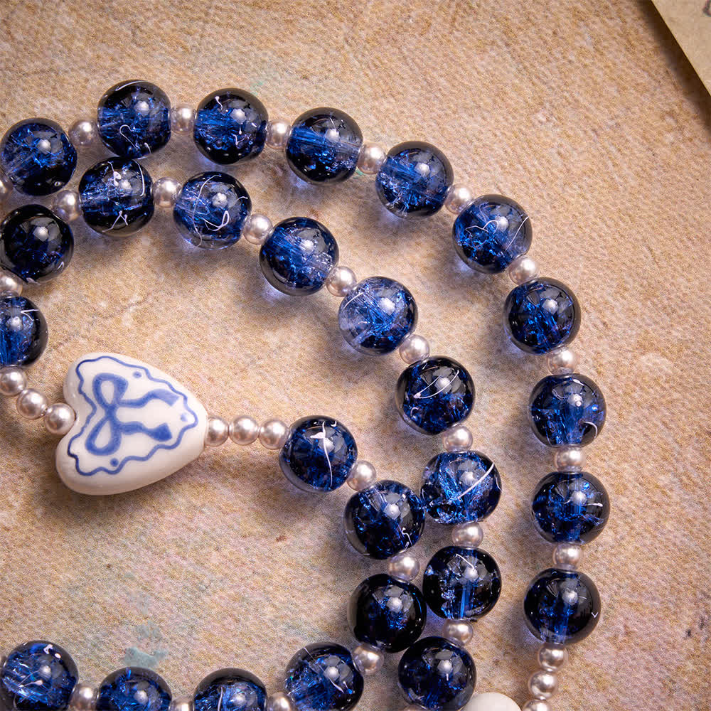 Blue Crackle Glass Rosary With Ceramic Heart Bow Beads & Our Lady Medal