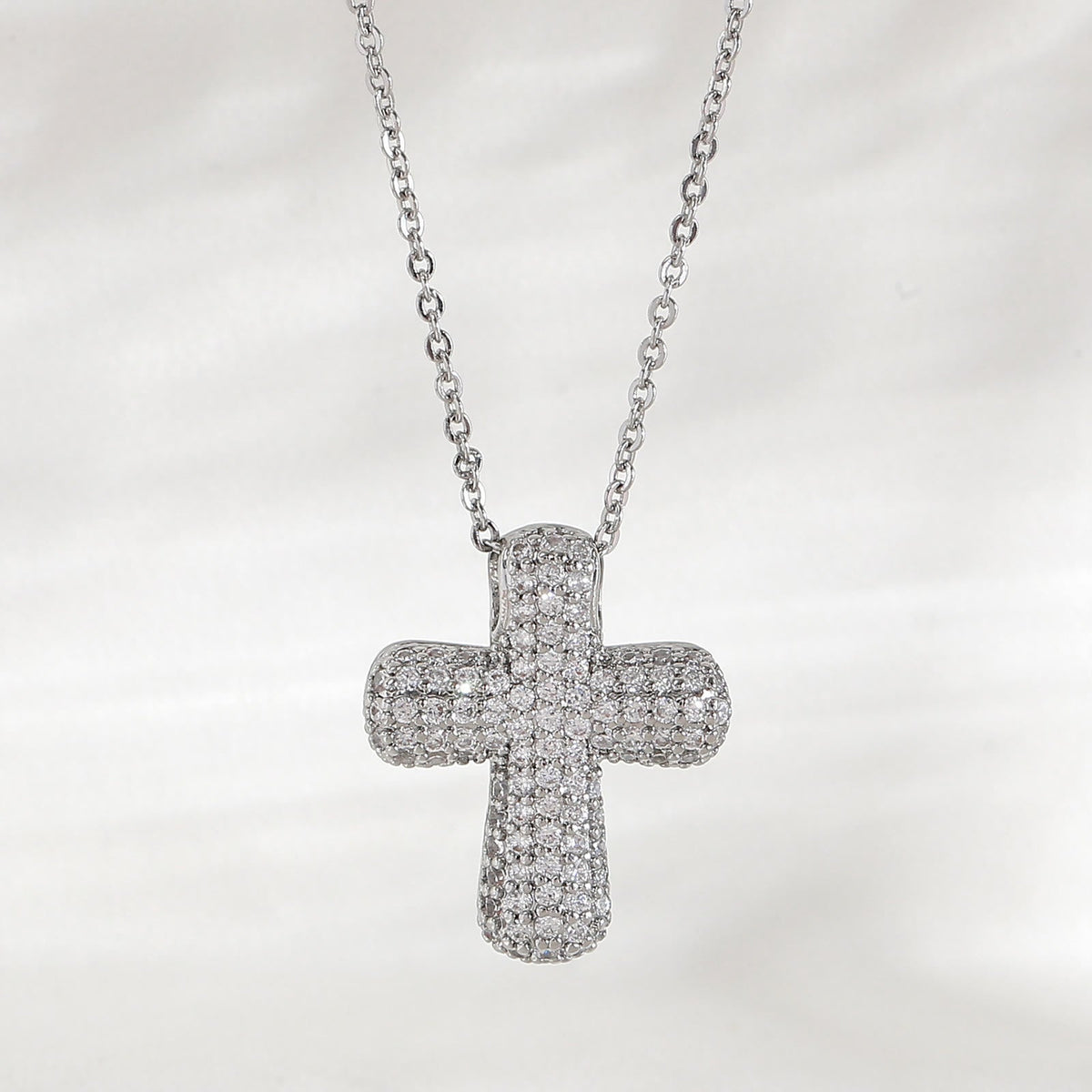 Sparkling Rounded-Tip Cross Necklace with Pavé Stones: Token of Sacred Redemptive Grace