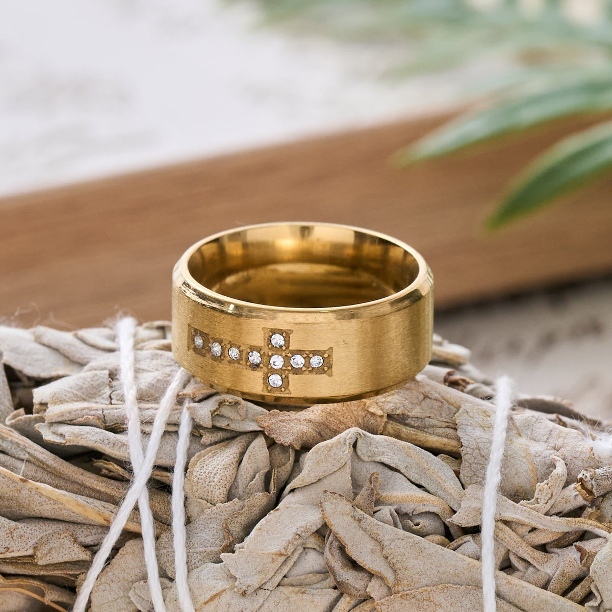 Sleek Wide Band Jeweled Cross Ring: Token of Calming Divine Guidance
