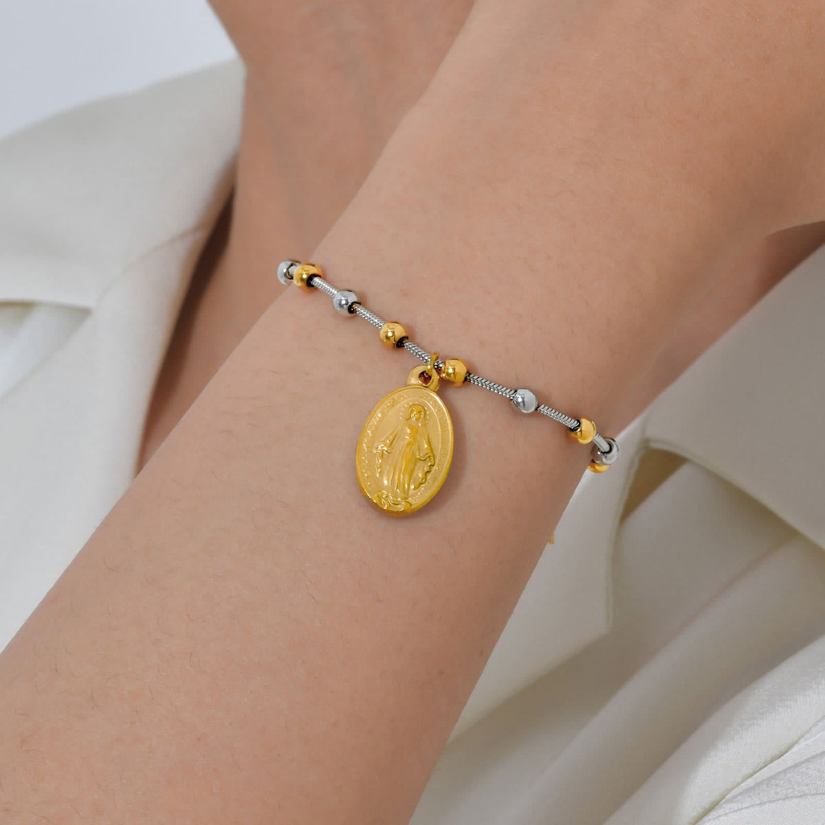Textured Bead‑Chain Medal Bracelet: Token of Sustained Inner Fortitude