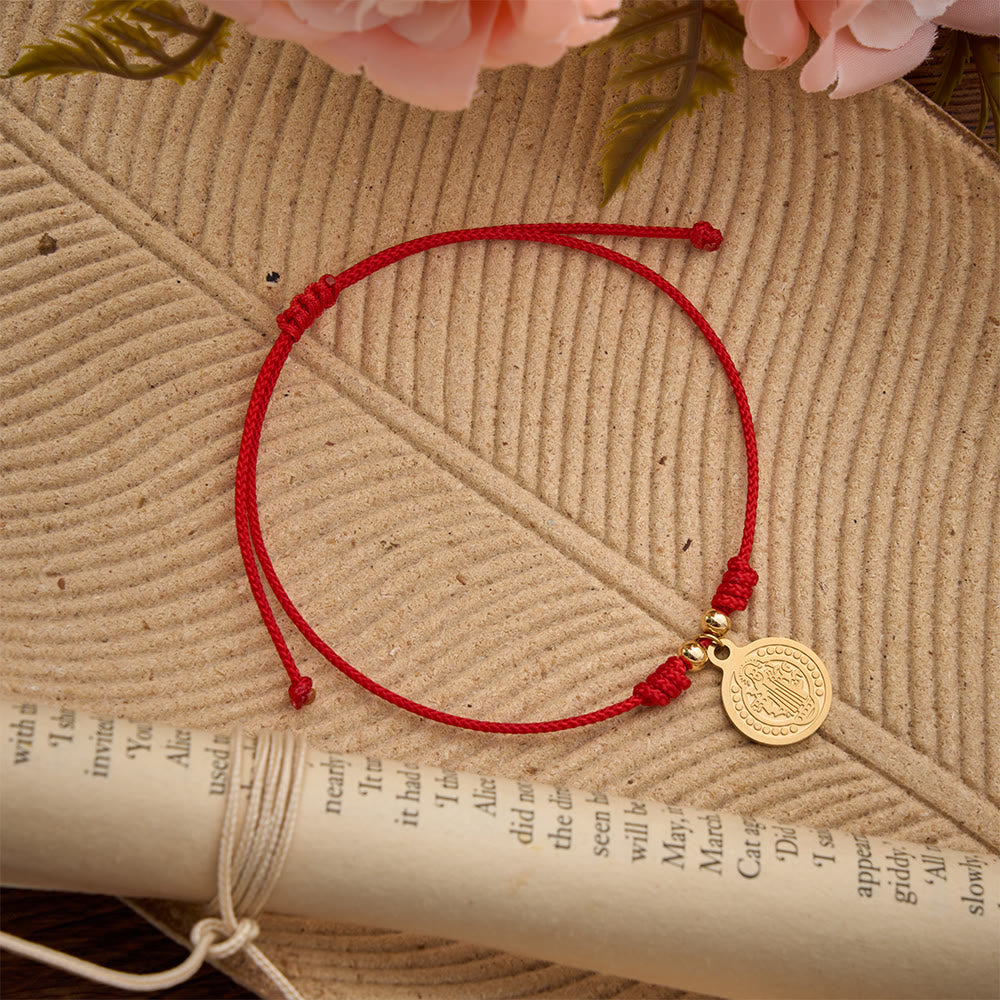 Figure‑Embossed Medal Woven Bracelet: Wearable Keepsake Of Timeless Heavenly Grace