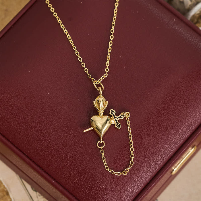 Sculpted Sacred Heart With Dagger Necklace: Symbol Of Calm Everlasting Peace