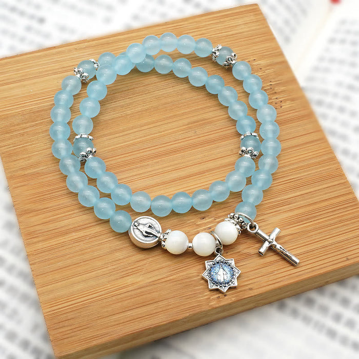 6mm Light Blue Bead Miraculous Medal & Crucifix Minimalist Bracelet: A Symbol of Faith