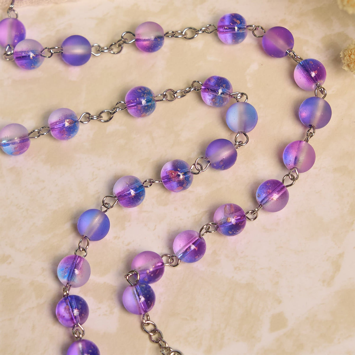 Frosted Blue and Purple Glass Beads Rosary Adorned with Miraculous Medal: Devotion in Textured Form
