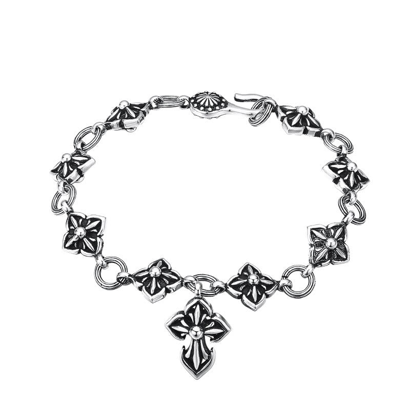 Retro - Styled Sterling Silver Cross Bracelet with Floral Motifs: A Nostalgic Sign of Faith