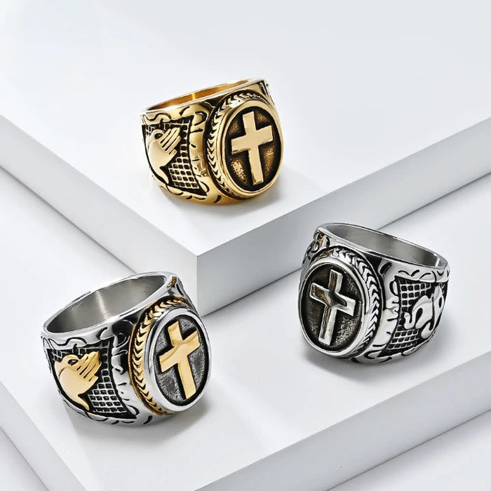 Metallic Cross Ring with Praying Hands Detail: Spiritual Fashion Pick