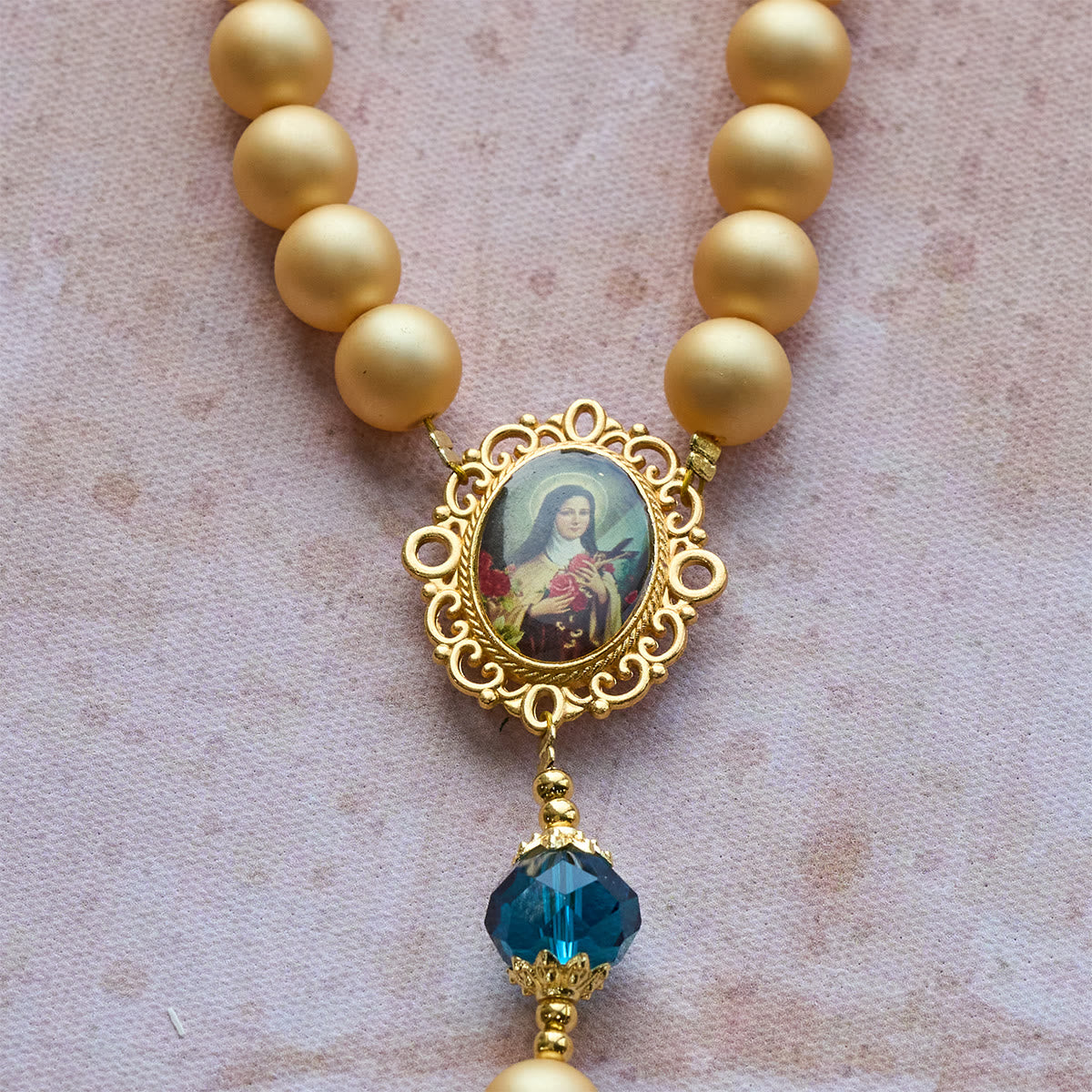 Elegant Matte Golden Pearl Rosary with St. Therese and Crucifix