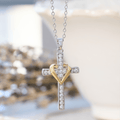 Silver Cross with Golden Heart