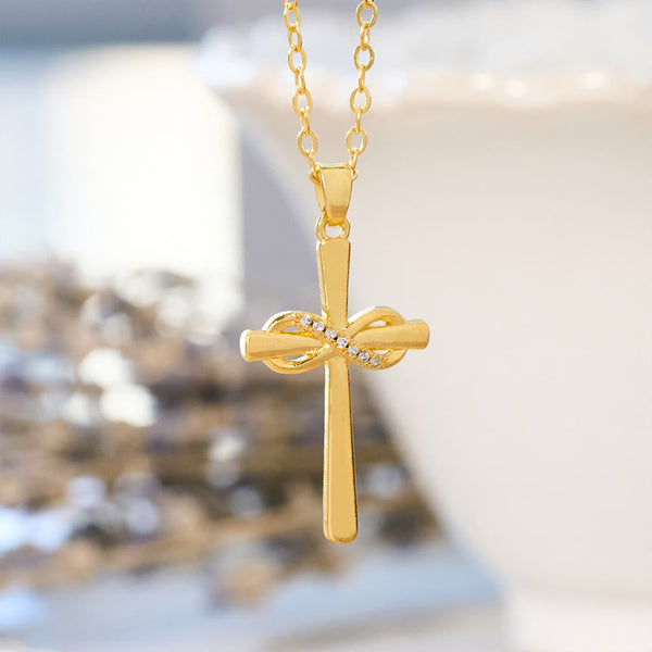 Möbius Cross & Zircon Necklaces: Smooth Comfort with Sacred Symbolism