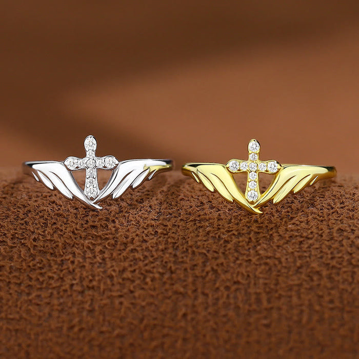 Silver Cross Wing Ring with Cubic Zirconia Accents: Embody His Angelic Protection