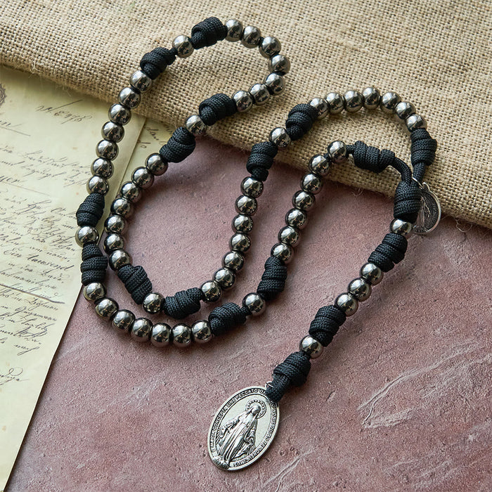 Seven Sorrows Paracord Rosary: A Symbol of Marian Compassion & Miraculous Grace