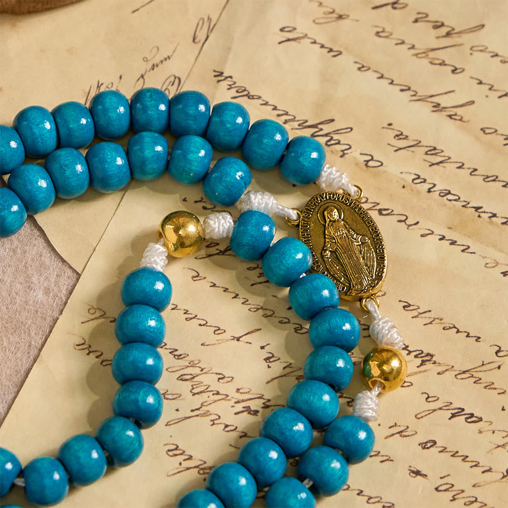 Blue Wooden Bead Rosary with Our Lady Medallion: A Symbol of Grace and Divine Faith