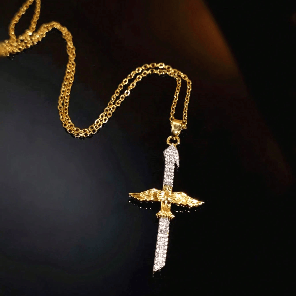 Sparkling Zircon Sword Cross Necklace with Dove Wings: A Reminder of Divine Protection