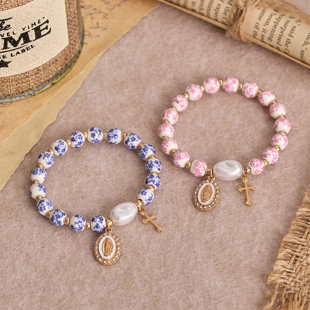 Blue/Pink Floral Ceramic Bead Bracelet with Large White Accent Bead: A Reminder of Divine Grace