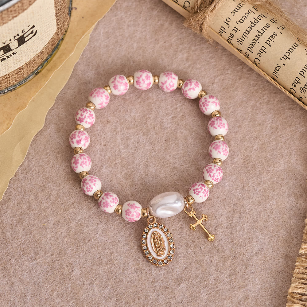 Blue/Pink Floral Ceramic Bead Bracelet with Large White Accent Bead: A Reminder of Divine Grace