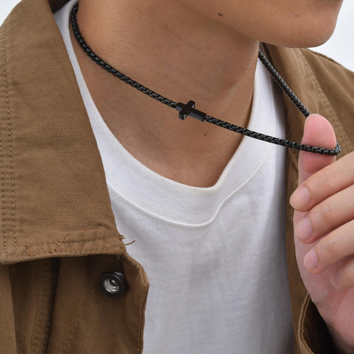 Sleek Stainless Steel Cross Necklace with Sideways Pendant: A Reminder of Divine Grace