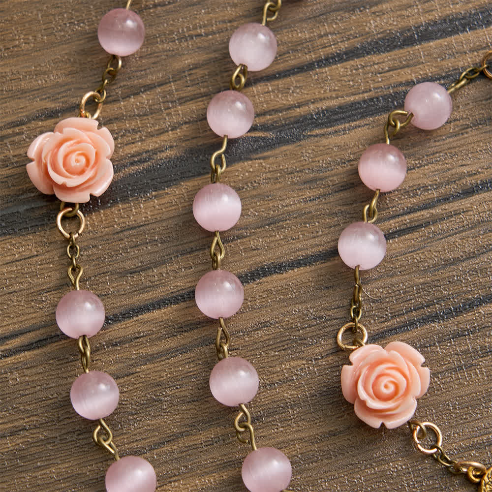 Luminous Pink Cat's Eye Rosary with Roses for Marian Devotion