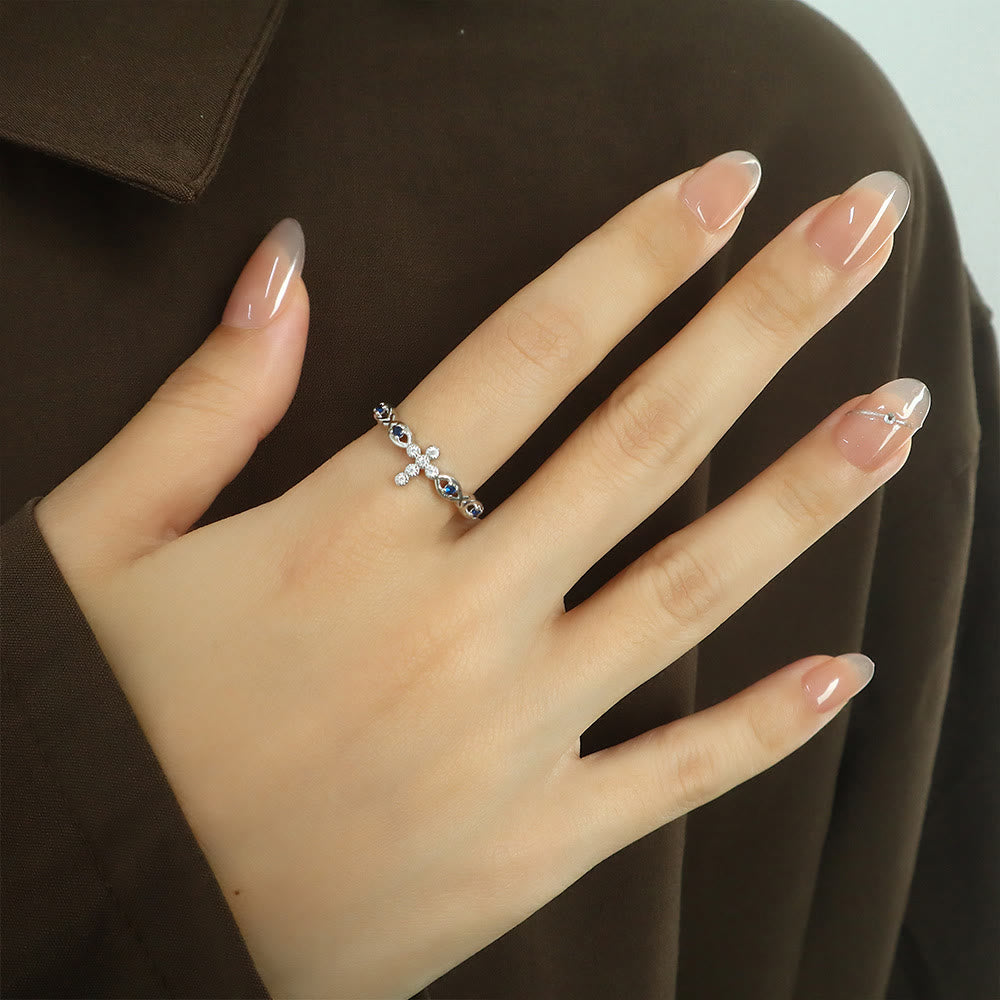 Dainty Cross Ring with Blue Zircon Accents: A Symbol of Faith and Serenity