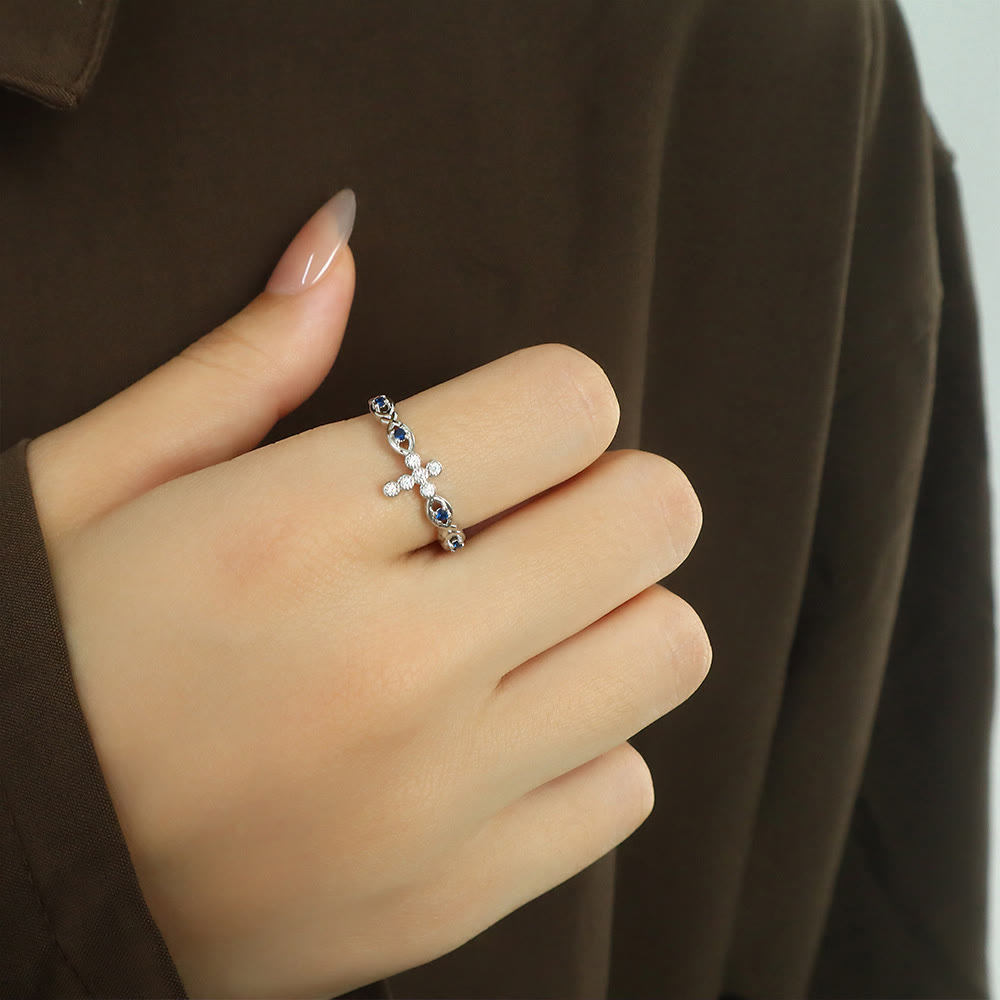 Dainty Cross Ring with Blue Zircon Accents: A Symbol of Faith and Serenity