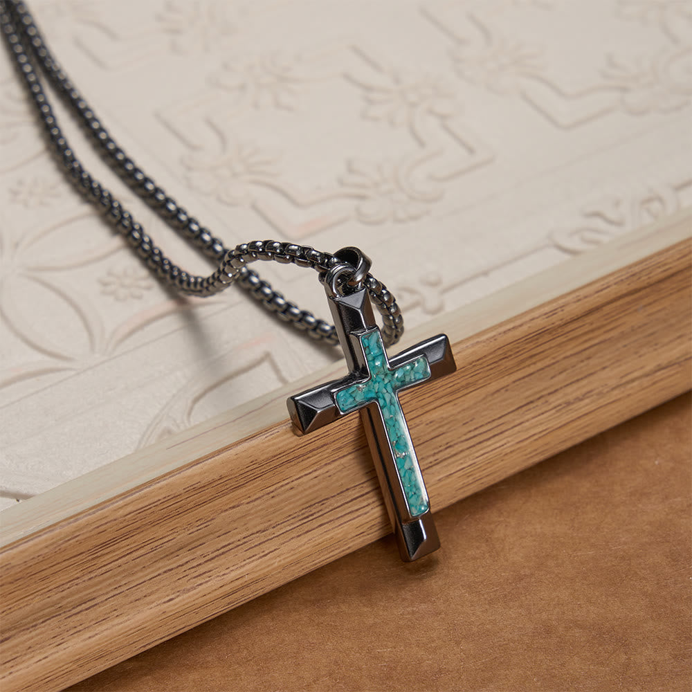 Polished Metal Cross Necklace with Turquoise Chip Inlay: A Reminder of Divine Grace