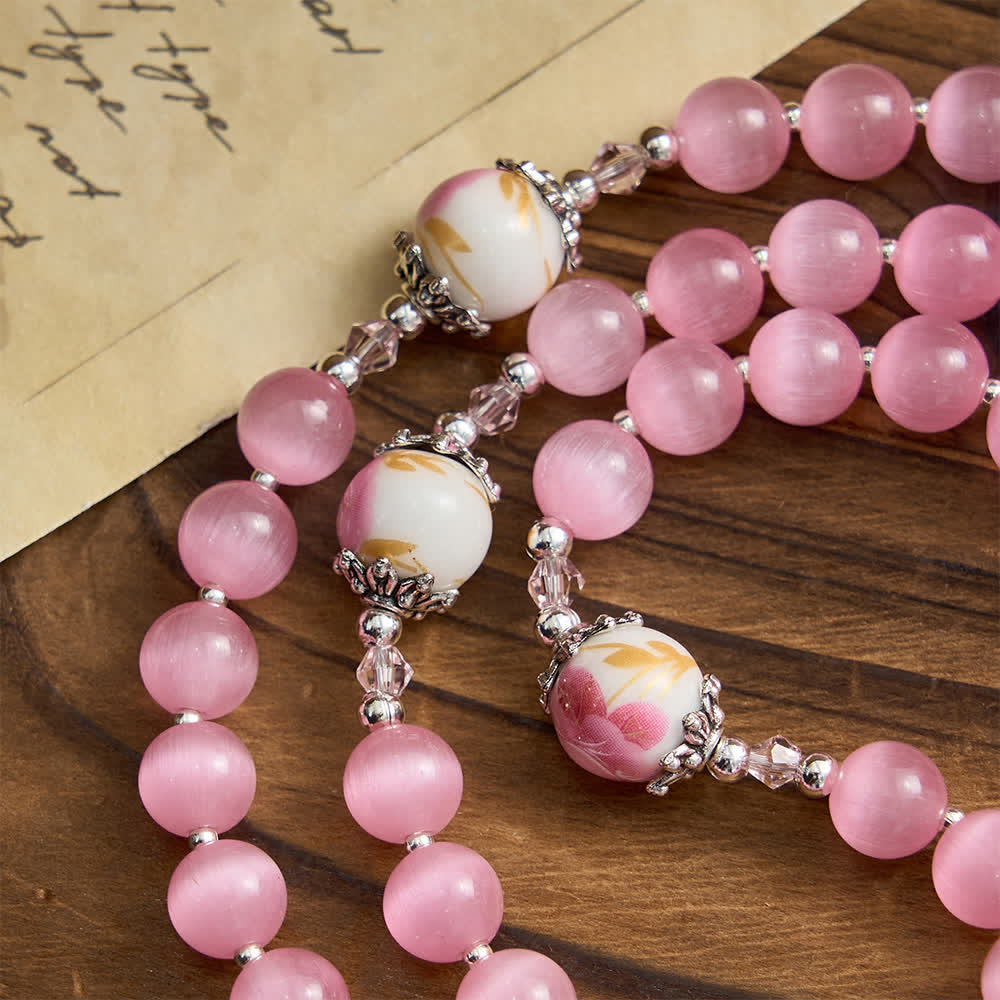 Elegant Pink Cat's Eye Rosary with Floral Marian Devotion