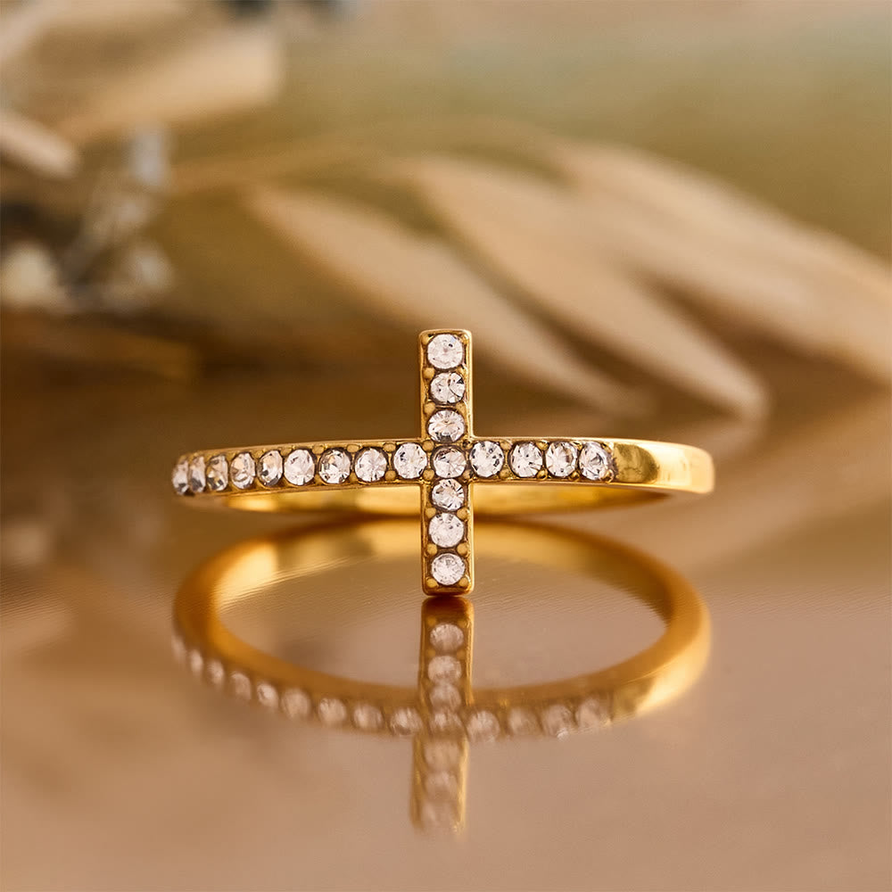 Delicate Sideways Cross Zircon Ring with All-Over Stone Setting: A Reminder of Understated Divine Grace