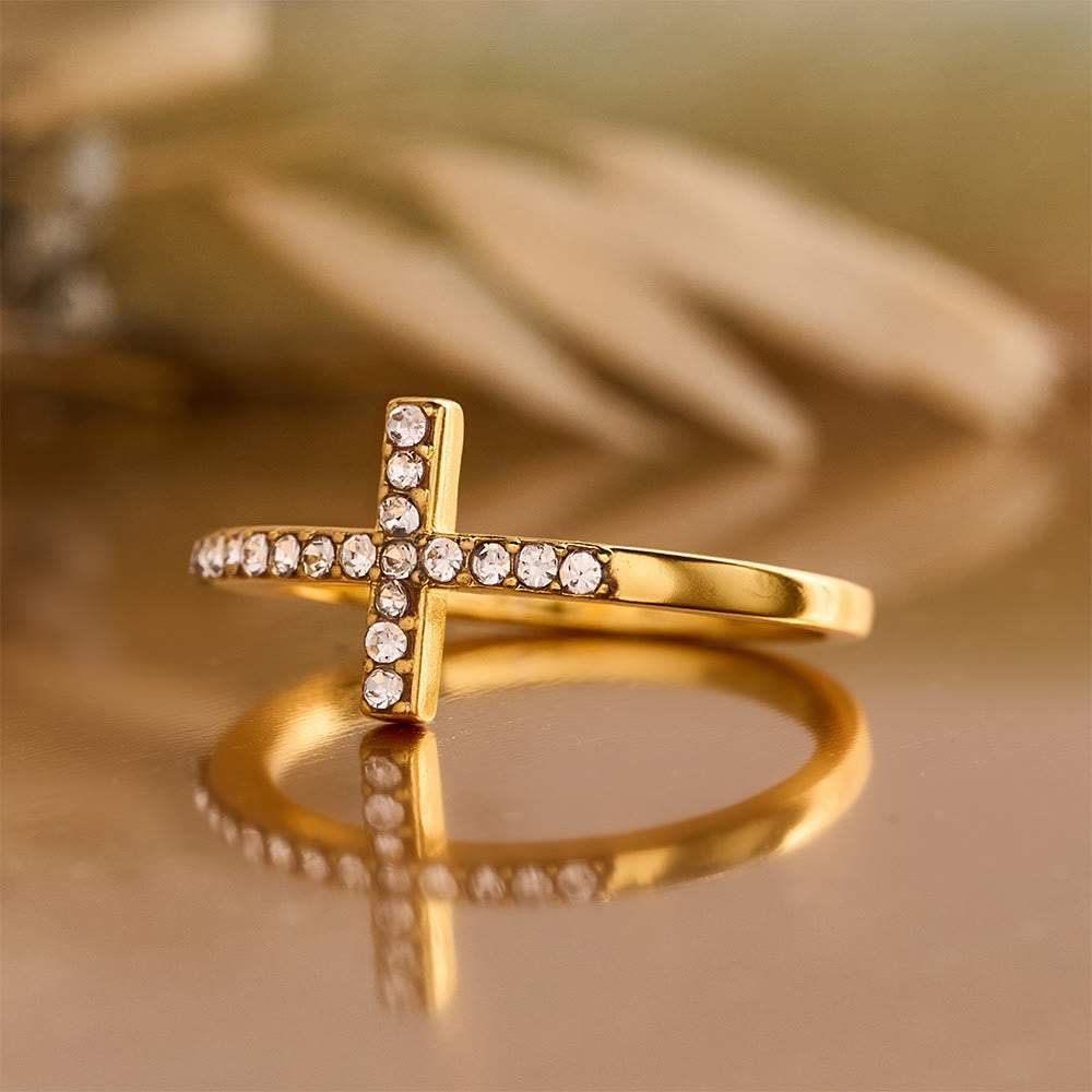 Delicate Sideways Cross Zircon Ring with All-Over Stone Setting: A Reminder of Understated Divine Grace