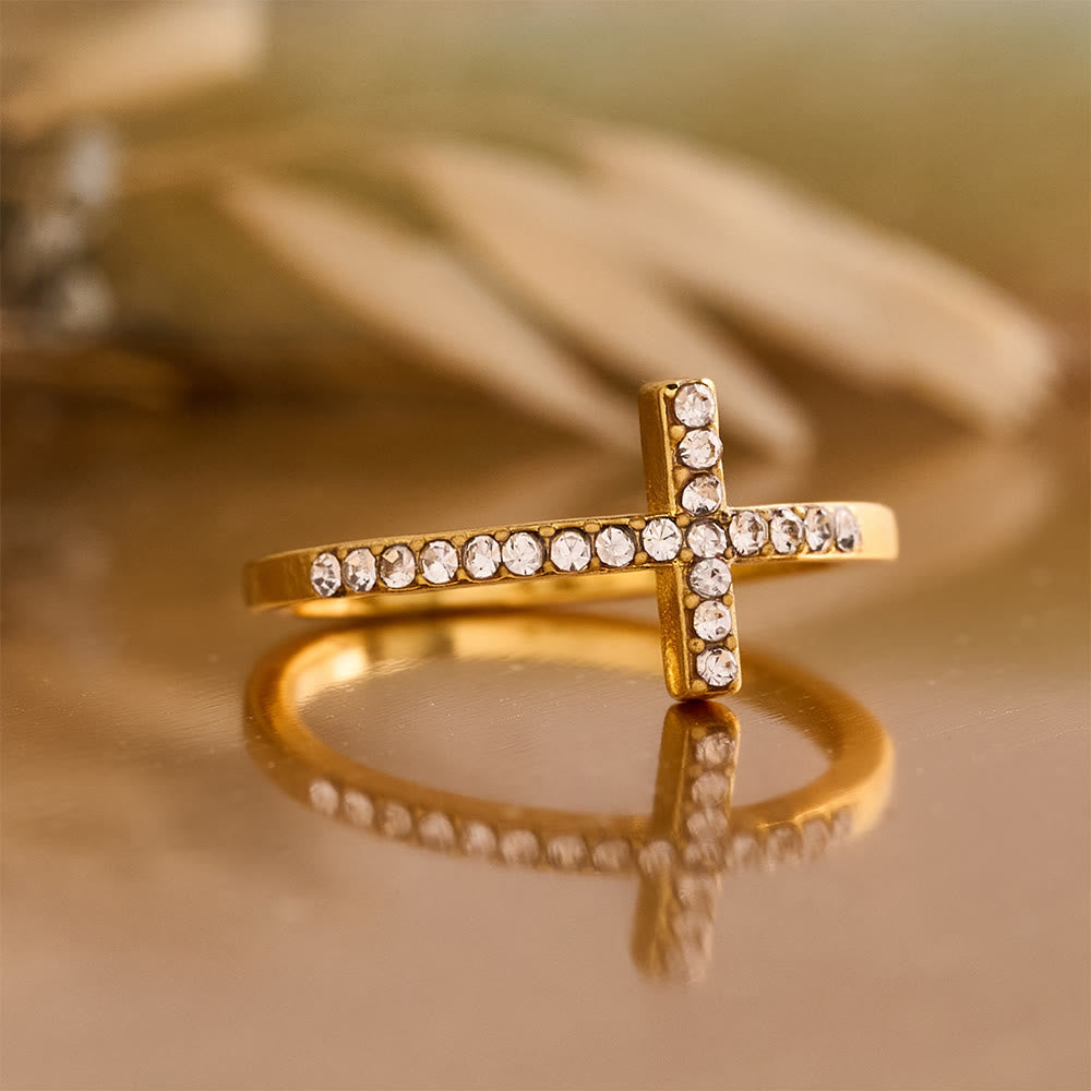 Delicate Sideways Cross Zircon Ring with All-Over Stone Setting: A Reminder of Understated Divine Grace