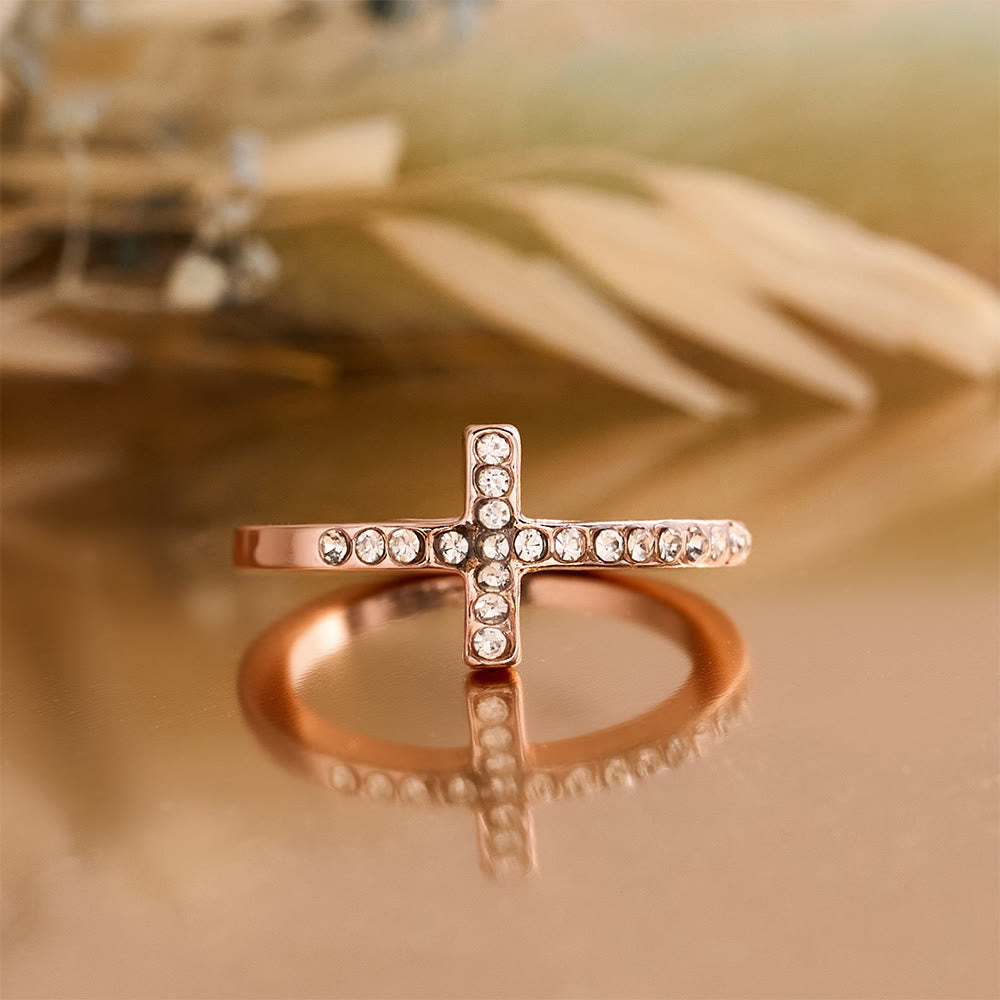 Delicate Sideways Cross Zircon Ring with All-Over Stone Setting: A Reminder of Understated Divine Grace