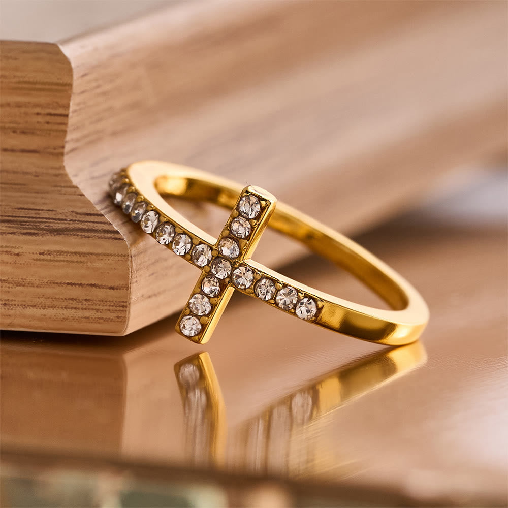 Delicate Sideways Cross Zircon Ring with All-Over Stone Setting: A Reminder of Understated Divine Grace