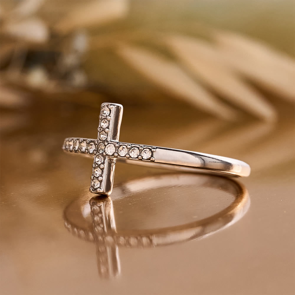 Delicate Sideways Cross Zircon Ring with All-Over Stone Setting: A Reminder of Understated Divine Grace