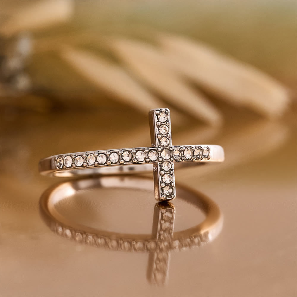 Delicate Sideways Cross Zircon Ring with All-Over Stone Setting: A Reminder of Understated Divine Grace