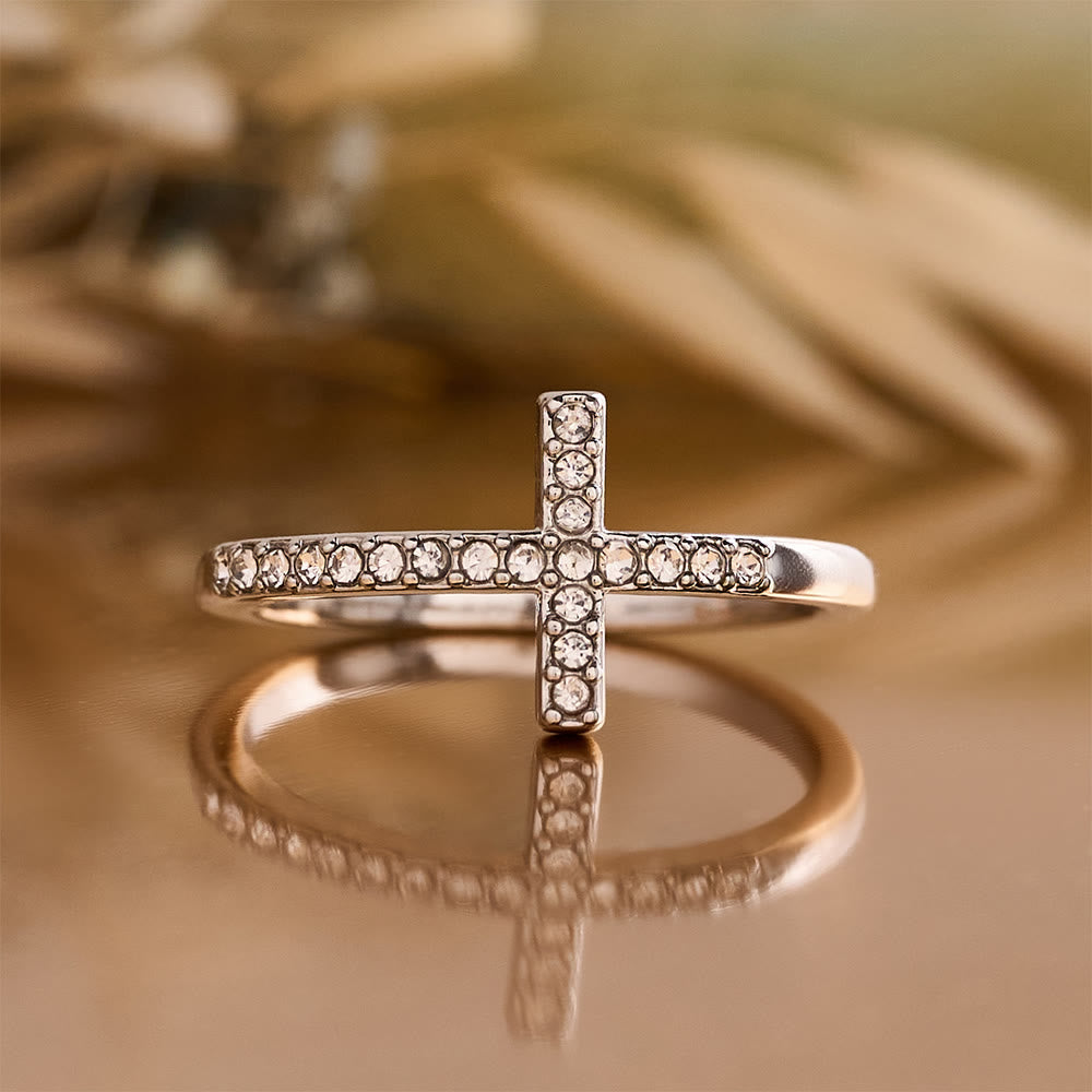 Delicate Sideways Cross Zircon Ring with All-Over Stone Setting: A Reminder of Understated Divine Grace