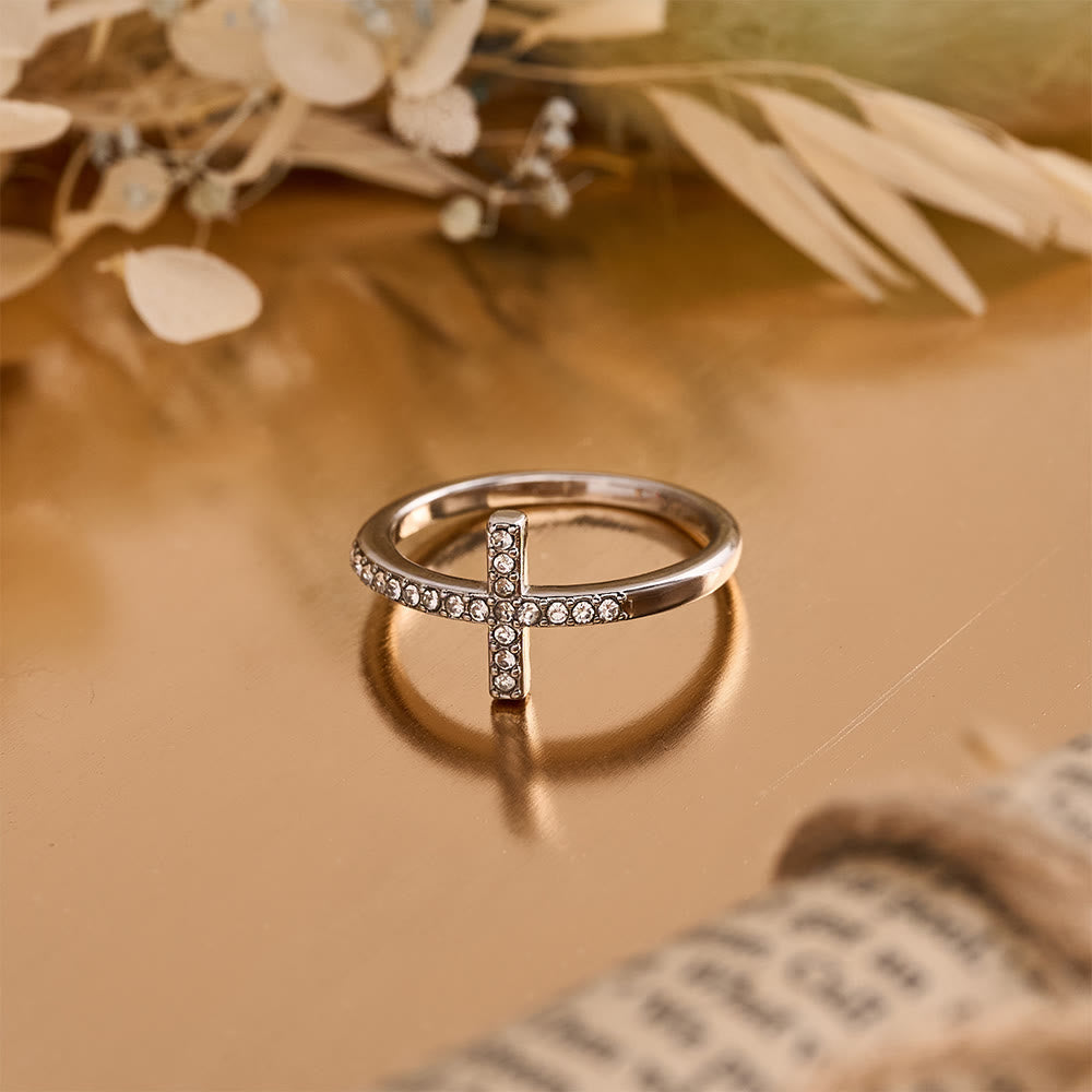 Delicate Sideways Cross Zircon Ring with All-Over Stone Setting: A Reminder of Understated Divine Grace