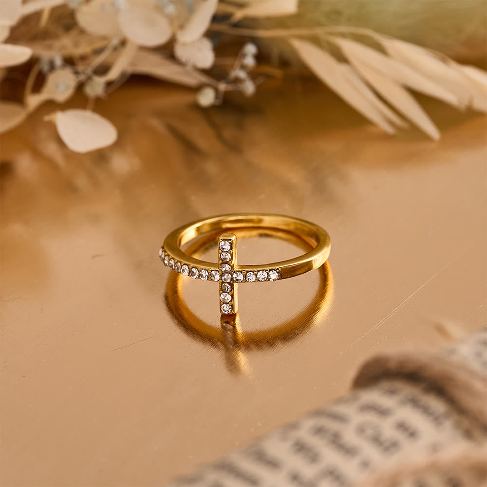 Delicate Sideways Cross Zircon Ring with All-Over Stone Setting: A Reminder of Understated Divine Grace