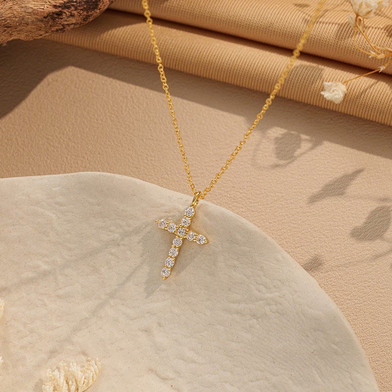 Minimalist Zircon Cross Necklace in Gold and Silver Tones: A Reminder of Subtle Divine Grace